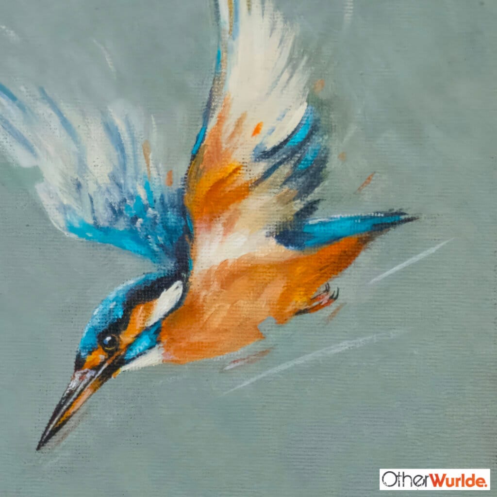 "The Fisher King..." painted by renowned UK wildlife artist Ann Richmond, is a dynamic, inspiring portrait of a Kingfisher as it dives to investigate ripples... The piece comes alive with vibrant brush strokes over a richly textured canvas, capturing the delicate interplay of nature in a moment of quiet wonder. Each piece in The Wylde Ones is rendered in Richmond’s fresh, energetic, and gestural new style—a deliberate departure from her works in The Otherwurlde Collection. The backgrounds are carefully matched to hues from a heritage palette we affectionately call “Barrow & Fall”; complementing these striking and distinctive portrayals of British wildlife. Discover the original works and fine-art prints at Otherwurlde.com.