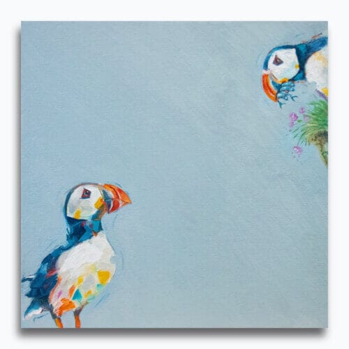 'Catch of the Day...', features a watchful Puffin, whose vigil is rewarded by the return of its partner; its beak overflowing with silvery fish...! Painted by renowned UK wildlife artist Ann Richmond, the artwork comes alive with vibrant brush strokes over a richly textured canvas, capturing the delicate interplay of nature in a moment of quiet wonder. Each piece in The Wylde Ones is rendered in Richmond’s fresh, energetic, and gestural new style—a deliberate departure from her works in The Otherwurlde Collection. The backgrounds are carefully matched to hues from a heritage palette we affectionately call “Barrow & Fall”; complementing these striking and distinctive portrayals of British wildlife. Discover the original works and fine-art prints at Otherwurlde.com.