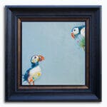 'Catch of the Day...', features a watchful Puffin, whose vigil is rewarded by the return of its partner; its beak overflowing with silvery fish...! Painted by renowned UK wildlife artist Ann Richmond, the artwork comes alive with vibrant brush strokes over a richly textured canvas, capturing the delicate interplay of nature in a moment of quiet wonder. Each piece in The Wylde Ones is rendered in Richmond’s fresh, energetic, and gestural new style—a deliberate departure from her works in The Otherwurlde Collection. The backgrounds are carefully matched to hues from a heritage palette we affectionately call “Barrow & Fall”; complementing these striking and distinctive portrayals of British wildlife. Discover the original works and fine-art prints at Otherwurlde.com.