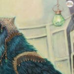 Ravensong… painted by UK fantasy artist Ann Richmond, presents a striking raven at rest within the scribing hall of the Otherwurlde. Usually intent on engraving guidance upon the legendary Pearls of Wisdom, here it pauses—head cocked, beak poised—as though weighing what the next rune should reveal. A golden shaft of light illuminates the shelves and urns around it, symbols of the knowledge entrusted to this enigmatic guardian. The painting reflects an old truth: a bird does not sing because it has an answer, but because it has a song. In this moment of stillness, the raven’s presence suggests that wisdom lies not in final answers, but in the ongoing song itself—the search, the patience, the story unfolding. Part of the Otherwurlde Collection—created in collaboration with writer Gary Hyland—Ravensong invites collectors into a world where armoured animals and hidden narratives converge. Available as the original artwork and in a limited range of fine-art prints. Discover more at Otherwurlde.com.