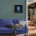 Barn Owlet, created by innovative UK digital artist Gary Hyland, captures the stunning innocence of a baby Barn Owl, delicately placed against a smoothly graduated rich sapphire-blue background. This enchanting piece from the Fauna Collection celebrates the purity and charm of nature through a minimalist yet captivating composition, where the subtle accents in the Owl's feathers resonate with the backdrop. An impossibly cute and gentle vision, Barn Owlet transports us to a timeless, unspoiled realm of natural beauty, blended with a subtle twist of colour. Discover original artworks and fine-art prints from this endearing series at Otherwurlde.com.