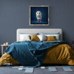 Barn Owlet, created by innovative UK digital artist Gary Hyland, captures the stunning innocence of a baby Barn Owl, delicately placed against a smoothly graduated rich sapphire-blue background. This enchanting piece from the Fauna Collection celebrates the purity and charm of nature through a minimalist yet captivating composition, where the subtle accents in the Owl's feathers resonate with the backdrop. An impossibly cute and gentle vision, Barn Owlet transports us to a timeless, unspoiled realm of natural beauty, blended with a subtle twist of colour. Discover original artworks and fine-art prints from this endearing series at Otherwurlde.com.