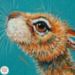 “Moongazing…” captures a quietly evocative moment as a hare stretches its neck, transfixed by the glow of a full moon. A pale moth drifts past its nose, unnoticed, as the hardy creature remains utterly absorbed in the mystery of the night sky. Painted by renowned UK wildlife artist Ann Richmond, the artwork comes alive with vibrant brush strokes over a richly textured canvas, capturing the delicate interplay of nature in a moment of quiet wonder. Each piece in The Wylde Ones is rendered in Richmond’s fresh, energetic, and gestural new style—a deliberate departure from her works in The Otherwurlde Collection. The backgrounds are carefully matched to hues from a heritage palette we affectionately call “Barrow & Fall”; complementing these striking and distinctive portrayals of British wildlife. Discover the original works and fine-art prints at Otherwurlde.com.