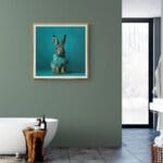 Leveret, created by innovative UK digital artist Gary Hyland, captures the stunning innocence of a baby hare, delicately colour-tinted to harmonise with a soft, graduated blue background. This enchanting piece from the Fauna Collection celebrates the purity and charm of nature through a minimalist yet captivating composition, where the blue accents in the leveret’s fur resonate with the serene backdrop. An impossibly cute and gentle vision, Leveret transports us to a timeless, unspoiled realm of natural beauty, blended with a subtle twist of colour. Discover original artworks and fine-art prints from this endearing series at Otherwurlde.com.