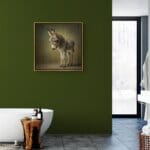 Donkey Foal, created by innovative UK digital artist Gary Hyland, captures the stunning innocence of a baby Donkey, delicately colour-tinted to harmonise with a graduated, earthy olive-green background. This enchanting piece from the Fauna Collection celebrates the purity and charm of nature through a minimalist yet captivating composition, where the subtle grey & gingery-brown accents in the Donkey's fur resonate with the backdrop. An impossibly cute and gentle vision, Donkey Foal transports us to a timeless, unspoiled realm of natural beauty, blended with a subtle twist of colour. Discover original artworks and fine-art prints from this endearing series at Otherwurlde.com.