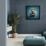 Hoglet, created by innovative UK digital artist Gary Hyland, captures the stunning innocence of a baby Hedgehog, delicately colour-tinted to harmonise with a soft, graduated blue background. This enchanting piece from the Fauna Collection celebrates the purity and charm of nature through a minimalist yet captivating composition, where the blue accents in the Hoglet's quills resonate with the serene backdrop. An impossibly cute and gentle vision, Hoglet transports us to a timeless, unspoiled realm of natural beauty, blended with a subtle twist of colour. Discover original artworks and fine-art prints from this endearing series at Otherwurlde.com.