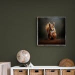 Red Squirrel Kit, created by innovative UK digital artist Gary Hyland, captures the stunning innocence of a baby Red Squirrel, delicately colour-tinted to harmonise with a graduated chestnut-brown background. This enchanting piece from the Fauna Collection celebrates the purity and charm of nature through a minimalist yet captivating composition, where the rich orange accents in the squirrel's brush-tail & fur resonate with the dark backdrop. An impossibly cute and gentle vision, Squirrel Kit transports us to a timeless, unspoiled realm of natural beauty, blended with a subtle twist of colour. Discover original artworks and fine-art prints from this endearing series at Otherwurlde.com.