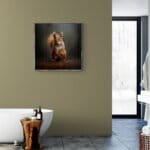 Red Squirrel Kit, created by innovative UK digital artist Gary Hyland, captures the stunning innocence of a baby Red Squirrel, delicately colour-tinted to harmonise with a graduated chestnut-brown background. This enchanting piece from the Fauna Collection celebrates the purity and charm of nature through a minimalist yet captivating composition, where the rich orange accents in the squirrel's brush-tail & fur resonate with the dark backdrop. An impossibly cute and gentle vision, Squirrel Kit transports us to a timeless, unspoiled realm of natural beauty, blended with a subtle twist of colour. Discover original artworks and fine-art prints from this endearing series at Otherwurlde.com.