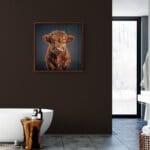 Highland Calf – Ginger by innovative UK digital artist Gary Hyland captures the irresistible charm of a young Highland calf, its soft, tousled ginger fur glowing warmly against a gentle, graduated slate-grey background. This captivating piece from the Fauna Collection celebrates the endearing innocence of nature through a minimalist yet emotive composition, where delicate highlights in the calf’s coat subtly harmonise with the serene backdrop. A vision of rustic beauty and quiet grace, Highland Calf – Ginger transports us to a timeless pastoral setting, infused with warmth and tranquillity. Discover original artworks and fine-art prints from this heartwarming series at Otherwurlde.com.