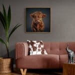 Highland Calf – Ginger by innovative UK digital artist Gary Hyland captures the irresistible charm of a young Highland calf, its soft, tousled ginger fur glowing warmly against a gentle, graduated slate-grey background. This captivating piece from the Fauna Collection celebrates the endearing innocence of nature through a minimalist yet emotive composition, where delicate highlights in the calf’s coat subtly harmonise with the serene backdrop. A vision of rustic beauty and quiet grace, Highland Calf – Ginger transports us to a timeless pastoral setting, infused with warmth and tranquillity. Discover original artworks and fine-art prints from this heartwarming series at Otherwurlde.com.