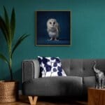 Barn Owlet, created by innovative UK digital artist Gary Hyland, captures the stunning innocence of a baby Barn Owl, delicately placed against a smoothly graduated rich sapphire-blue background. This enchanting piece from the Fauna Collection celebrates the purity and charm of nature through a minimalist yet captivating composition, where the subtle accents in the Owl's feathers resonate with the backdrop. An impossibly cute and gentle vision, Barn Owlet transports us to a timeless, unspoiled realm of natural beauty, blended with a subtle twist of colour. Discover original artworks and fine-art prints from this endearing series at Otherwurlde.com.