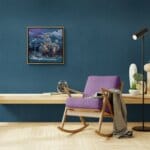 Infinite Dreams, painted by renowned UK fantasy artist Ann Richmond, is a mysterious and enigmatic piece of fantasy art featuring an African elephant aboard a whimsical little steamboat... Part of the Otherwurlde Collection—and created in collaboration with writer Gary Hyland—the piece transports viewers into a magical realm where armoured animals and evocative narratives come to life. Offered as affordable art with story, collectors can choose between the original artwork and an exclusive range of fine-art prints. Discover the enchantment at Otherwurlde.com.