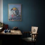 Keeper of the Keys, painted by renowned UK fantasy artist Ann Richmond, is a striking piece of fantasy art showcasing a proud Toucan and his Mouse companion. Part of the Otherwurlde Collection—and created in collaboration with writer Gary Hyland—the piece transports viewers into a magical realm where armoured animals and evocative narratives come to life. Offered as affordable art with story, collectors can choose between the original artwork and an exclusive range of fine-art prints. Discover the enchantment at Otherwurlde.com.