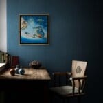 A Bigger Fish, painted by renowned UK fantasy artist Ann Richmond, is a whimsical and inspirational piece of fantasy art featuring a kingfisher and his pet stickleback as they contemplate the arrival of a humble blue-tit with its enormous carp! Part of the Otherwurlde Collection—and created in collaboration with writer Gary Hyland—the piece transports viewers into a magical realm where armoured animals and evocative narratives come to life. Offered as affordable art with story, collectors can choose between the original artwork and an exclusive range of fine-art prints. Discover the enchantment at Otherwurlde.com.