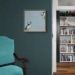 'Catch of the Day...', features a watchful Puffin, whose vigil is rewarded by the return of its partner; its beak overflowing with silvery fish...! Painted by renowned UK wildlife artist Ann Richmond, the artwork comes alive with vibrant brush strokes over a richly textured canvas, capturing the delicate interplay of nature in a moment of quiet wonder. Each piece in The Wylde Ones is rendered in Richmond’s fresh, energetic, and gestural new style—a deliberate departure from her works in The Otherwurlde Collection. The backgrounds are carefully matched to hues from a heritage palette we affectionately call “Barrow & Fall”; complementing these striking and distinctive portrayals of British wildlife. Discover the original works and fine-art prints at Otherwurlde.com.