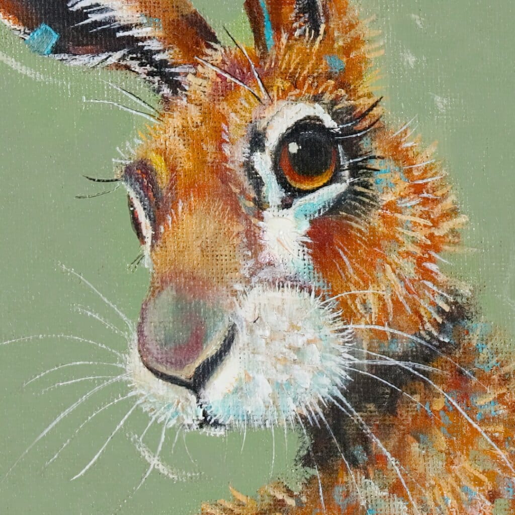 'Harebell...' features a vigilant Hare, who has suddenly heard the 'BUZZ!' of a bumblebee, but can't place the source: all he can see is the distinctive trumpet of a Morning Glory flower... Can YOU spot it? Painted by renowned UK wildlife artist Ann Richmond, the artwork comes alive with vibrant brush strokes over a richly textured canvas, capturing the delicate interplay of nature in a moment of quiet wonder. Each piece in The Wylde Ones is rendered in Richmond’s fresh, energetic, and gestural new style—a deliberate departure from her works in The Otherwurlde Collection. The backgrounds are carefully matched to hues from a heritage palette we affectionately call “Barrow & Fall”; complementing these striking and distinctive portrayals of British wildlife. Discover the original works and fine-art prints at Otherwurlde.com.