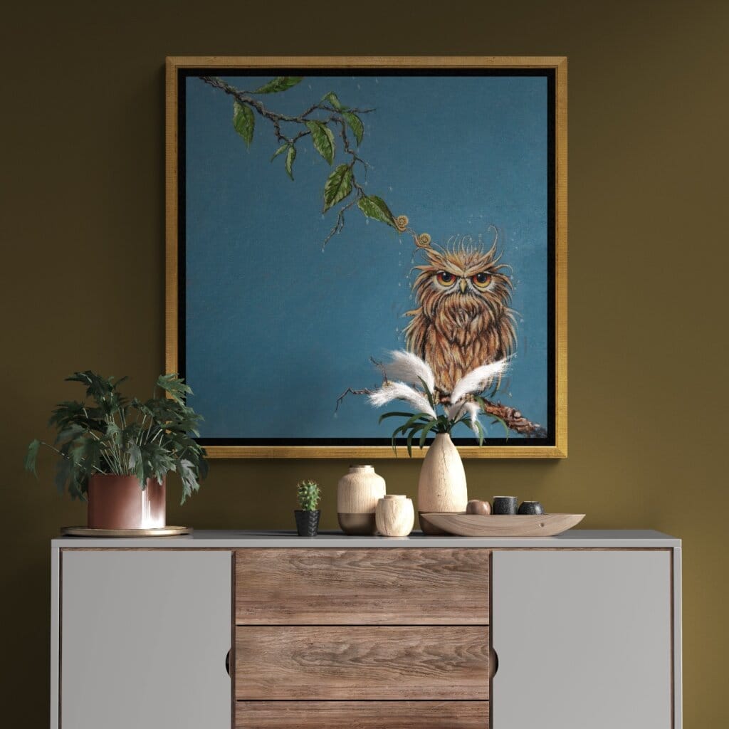 'Love in a Cold Climate...' is a loose sequel to the earlier piece 'Big Drip, Little Owl!'. In this latest painting, the featured character is a beautifully painted Horned Owl that has a little yellow snail sitting at the tip of one of its ears. Look closer: the snail has made contact with another that's balanced on an overhanging leaf! Little wonder that the owl looks so grumpy! Painted by renowned UK wildlife artist Ann Richmond, the artwork comes alive with vibrant brush strokes over a richly textured canvas, capturing the delicate interplay of nature in a moment of quiet wonder. Each piece in The Wylde Ones is rendered in Richmond’s fresh, energetic, and gestural new style—a deliberate departure from her works in The Otherwurlde Collection. The backgrounds are carefully matched to hues from a heritage palette we affectionately call “Barrow & Fall”; complementing these striking and distinctive portrayals of British wildlife. Discover the original works and fine-art prints at Otherwurlde.com.