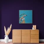 'Bad Hare Day…' is a whimsical study of a young hare sheltering beneath a leaf in a rainstorm — blissfully unaware that it’s dripping more water than it’s stopping. Raindrops splash and scatter across his fur in a scene full of humour, charm, and countryside mischief. A scene full of mischief, warmth, and woodland charm Painted by renowned UK wildlife artist Ann Richmond, the artwork comes alive with vibrant brush strokes over a richly textured canvas, capturing the delicate interplay of nature in a moment of quiet wonder. Each piece in The Wylde Ones is rendered in Richmond’s fresh, energetic, and gestural new style—a deliberate departure from her works in The Otherwurlde Collection. The backgrounds are carefully matched to hues from a heritage palette we affectionately call “Barrow & Fall”; complementing these striking and distinctive portrayals of British wildlife. Discover the original works and fine-art prints at Otherwurlde.com.