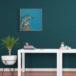 'Bad Hare Day…' is a whimsical study of a young hare sheltering beneath a leaf in a rainstorm — blissfully unaware that it’s dripping more water than it’s stopping. Raindrops splash and scatter across his fur in a scene full of humour, charm, and countryside mischief. A scene full of mischief, warmth, and woodland charm Painted by renowned UK wildlife artist Ann Richmond, the artwork comes alive with vibrant brush strokes over a richly textured canvas, capturing the delicate interplay of nature in a moment of quiet wonder. Each piece in The Wylde Ones is rendered in Richmond’s fresh, energetic, and gestural new style—a deliberate departure from her works in The Otherwurlde Collection. The backgrounds are carefully matched to hues from a heritage palette we affectionately call “Barrow & Fall”; complementing these striking and distinctive portrayals of British wildlife. Discover the original works and fine-art prints at Otherwurlde.com.