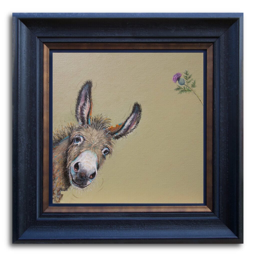 "You Called?" painted by renowned UK wildlife artist Ann Richmond, is a whimsical portrait featuring a donkey that's leaning into the painting, as if just noticing us. Or has it noticed that thistle? The piece comes alive with vibrant brush strokes over a richly textured canvas, capturing the delicate interplay of nature in a moment of quiet wonder. Each piece in The Wylde Ones is rendered in Richmond’s fresh, energetic, and gestural new style—a deliberate departure from her works in The Otherwurlde Collection. The backgrounds are carefully matched to hues from a heritage palette we affectionately call “Barrow & Fall”; complementing these striking and distinctive portrayals of British wildlife. Discover the original works and fine-art prints at Otherwurlde.com.